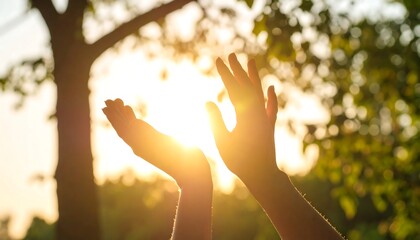 Hands raised to the sun