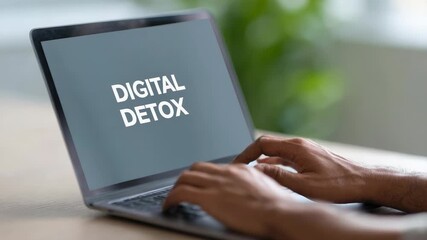Close up of a professional's hands rapidly typing digital detox on a laptop keyboard, suggesting a focus on disconnecting from technology and embracing a healthier work life balance - Powered by Adobe