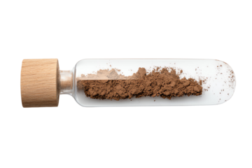 Brown powder in glass vial with wooden cork on white isolated background.