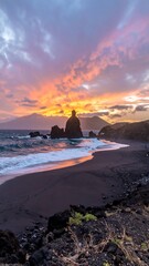 Dramatic sunset over volcanic beach (3)