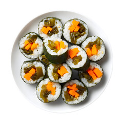 A top-down view of a white plate filled with small, bite-sized vegetable sushi rolls, showcasing fresh ingredients and a colorful presentation