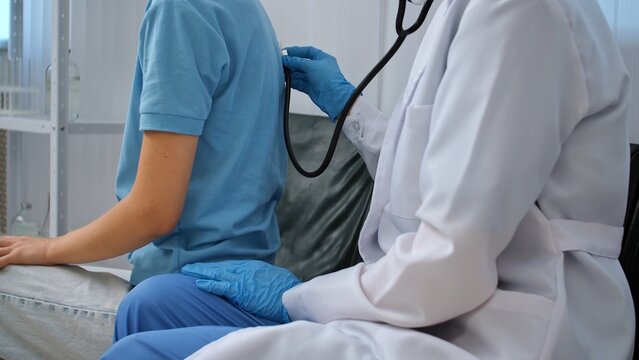 Medical Professional Conducting Patient Examination in a Clinic