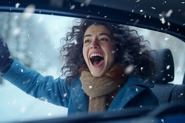 Joyful woman in car with snowy background, winter lifestyle