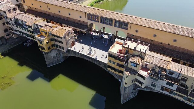 Drone cinematic shot Ponte Vecchio Florence Italy cultural heritage landmark