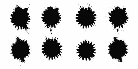 Collection of eight black ink splatters and splashes with a rough texture on a white background