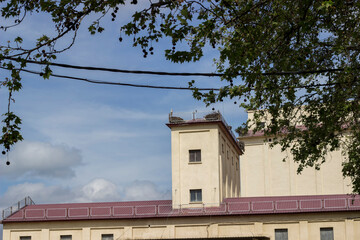the roof of a building with stork nests