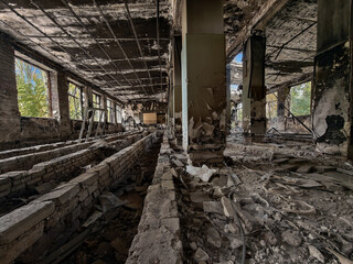 Fototapeta premium ruined street and destroyed houses the city Kiev war in Ukraine