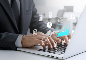 Business hands on laptop—analytics, growth, and digital strategy.