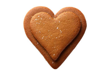 A Christmas gingerbread cookie shaped like a heart, isolated on a transparent background.