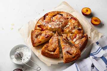 Homemade The New York Times plum and almond cake. Summer or autumn fruit pie. Home cooking. Selective focus.