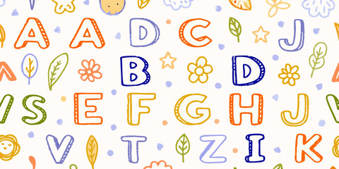 Cute hand drawn alphabet letters and playful elements seamless pattern for kids