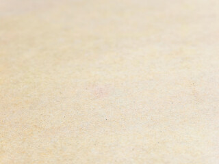 Empty Canvas of Beige: A smooth, textured surface of beige creates a blank canvas. Perfect for conveying a sense of calmness.