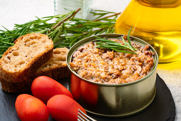 Canned tuna in brine isolated on vintage background	
