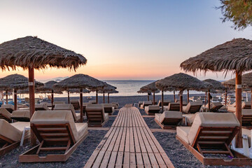 beach chairs and umbrellas on the beach