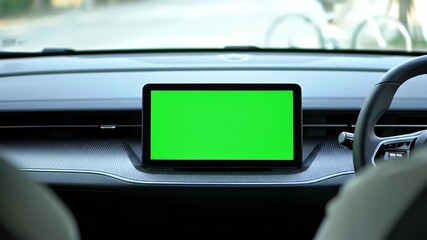 Blank green screen digital display on a modern car's dashboard, ideal for chroma key compositing, navigation, or app mockups. - Powered by Adobe