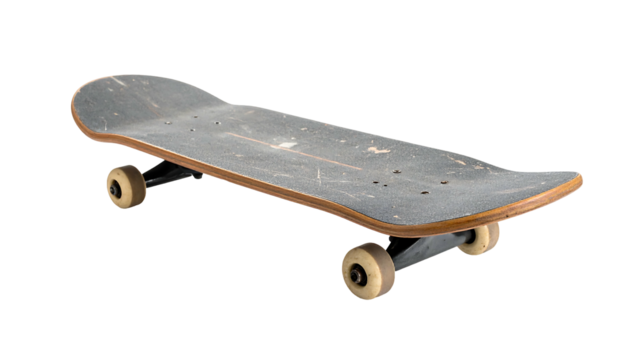 A complete used skateboard isolated on a white background.