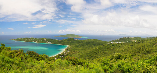 Magens Bay Beach, St. Thomas, US Virgin Islands. Panoramic aerial view of turquoise bay, white sandy shoreline and lush green hills, famous Caribbean tropical paradise