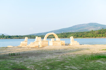 The ancient Roman ruins of Aquis Querquennis are located on the shores of a tranquil lake in Galicia, Spain.