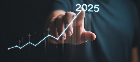 Person's finger touching a digital graph showing upward trend towards 2025 hand pointing