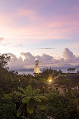 Family with children, visiting the Golden bridge with big golden hands holding it in Da Nang, Ba Ha Hills travel destination, Vietnam