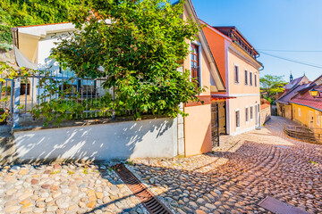 Charming old cobbled stone street in the historic old town of Ptuj, Slovenia