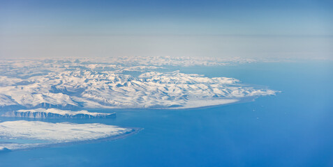Aerial view of snowy fjords on Baffin Island, Nunavut, Canada © Thomas