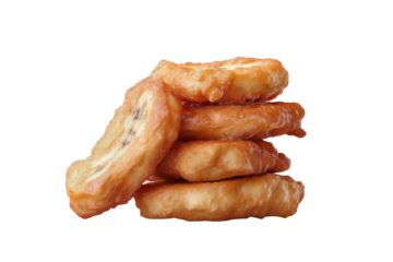 Golden brown fried hash browns stacked on black background, cut out