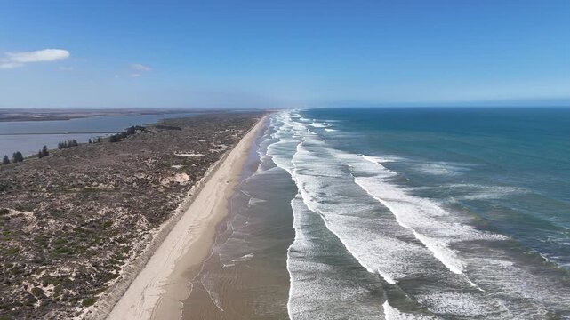 Goolwa Beach, South Australia Coastline: 4K Aerial Drone Footage of Cars on Sand, Rolling Dunes, Long Ocean Waves, Coastal Town and Scenic Nature Reserve near the Murray Mouth and Coorong