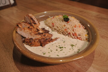 Grilled Chicken with Vegetable Rice and Creamy Sauce