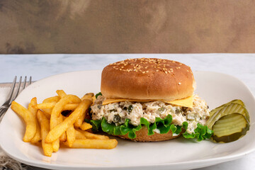 chicken  salad sandwich  with french fries