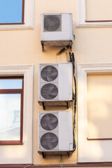 Air conditioners on the facade of the house, ventilation and cooling system, air purification technology. split system.
