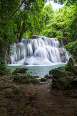 Lush jungle waterfall at Huay Mae Khamin national park, Tier 3 Wang Na Pha, Kanchanaburi, Thailand