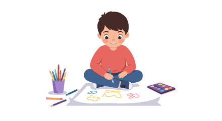 A young boy sits cross-legged on the floor, happily drawing on a large sheet of paper with crayons and paints.