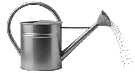 Isolated pouring metal watering can for plants and garden in spring or summer weather