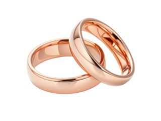 Elegant rose gold wedding rings symbolize love and commitment, featuring polished finish that reflects light beautifully