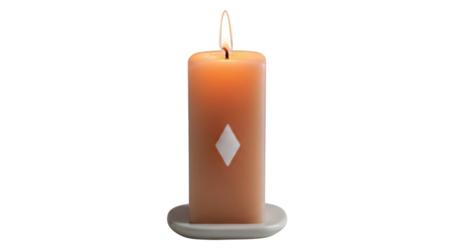 Isolated orange candle with diamond pattern sitting on a round candleholder, burning wick