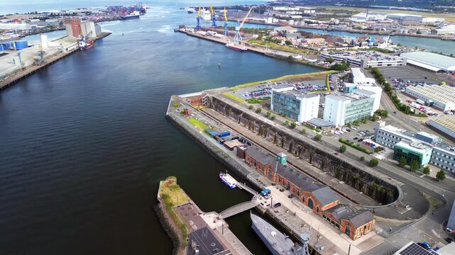 4K overhead rotating aerial video GV of Thompson Dry Dock in Belfast, County Antrim in Northern Ireland. Produced in 30FPS and with Rec709 color.