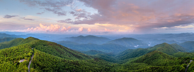 Evening mountain landscape of forest road in North Carolina Appalachians, USA. Blue Ridge Parkway...