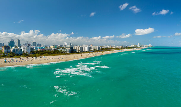 Popular vacation spot in the United States. Ocean warm waters and sandy beachfront at Miami Beach in Florida, USA. American travel destination