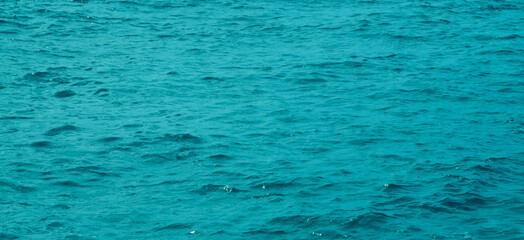 Transformative Teal abstract natural ocean water  toned texture background for design.2026 color of the year concept.
