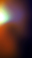 Abstract blend of warm and cool colors with a bright light source and grainy texture creating a soft gradient effect