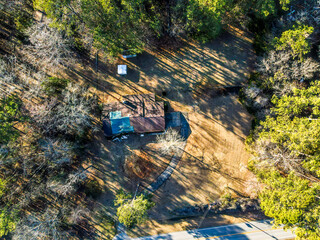 Aerial landscape rural forest in winter after Hurricane Helene in Appling Augusta Georgia