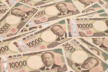 投資などに関する記事のサムネイルに多数の一万円札