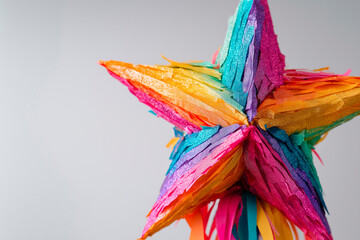 Colorful seven-pointed star piñata ready for Posadas Mexicanas holiday celebration