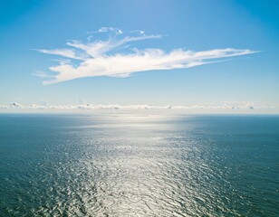 Vast ocean and cloud-filled sky