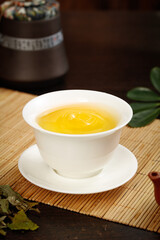 Traditional Chinese White Silver Needle Tea Tasting Ceremony with Fuding Tea Leaves on Bamboo Mat
