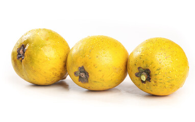 Fresh Yellow Citrus Fruits with Water Droplets on White Background