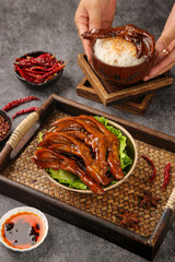 Spicy Marinated Duck Feet Traditional Asian Snacks with Rice and Chili Peppers