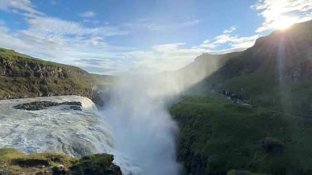 Pan of Tourists Viewpoint Overlooking Gullfoss Waterfall in Iceland