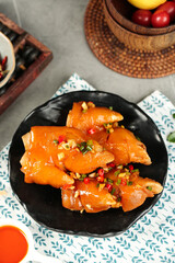 Marinated Pig Feet in Sauce - Traditional Asian Food Dish with Spices and Garnish